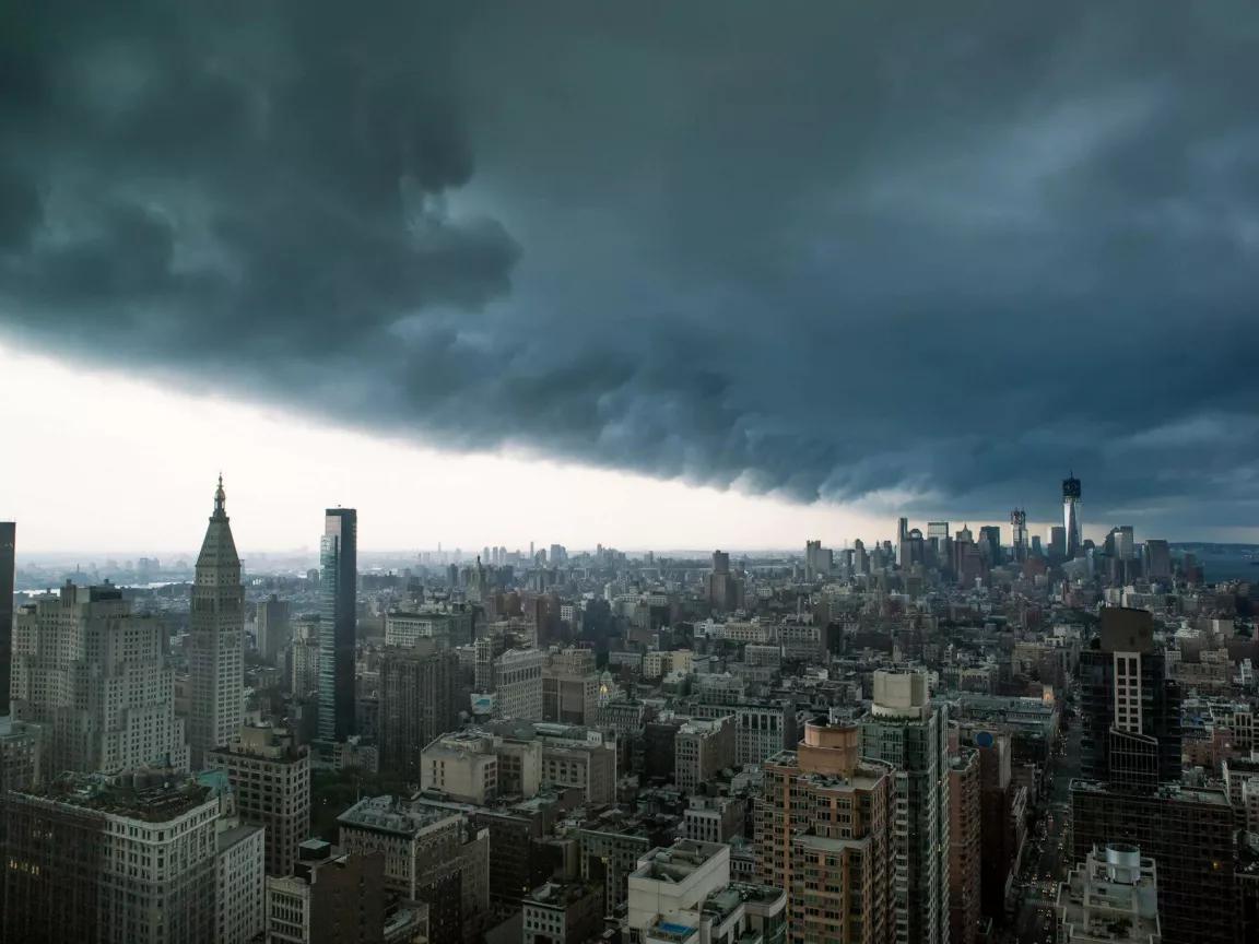 Dark storm clouds move in over the New York City skyline