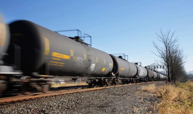 Dozens of tanker railcars on a train track