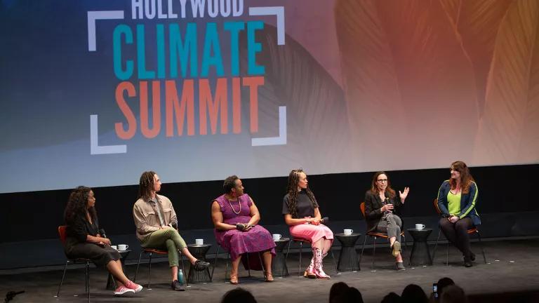 Six people sitting on a stage at the June 2023 Hollywood Climate Summit