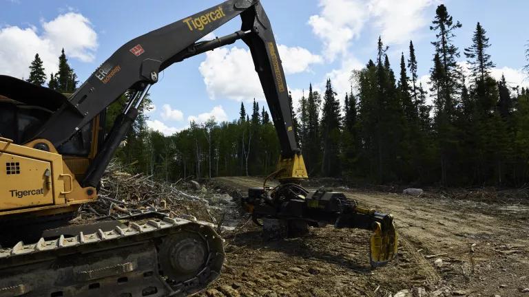 Image of machinery in boreal clearcut