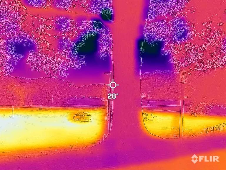 Screen capture from heat cameras show the vast differences in temperature between grassy and man-made areas on North Carolina State University’s campus.