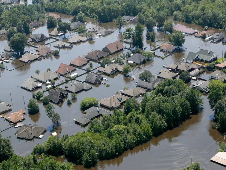 A residential neighborhood is inundated with floodwaters