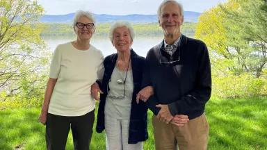 Joan Davidson (center), earlier this year, stands with former NRDC presidents Frances Beinecke and John H. Adams overlooking the Hudson River.