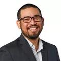 A headshot of Jon Colmenares