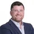 A headshot of Kyle T. Jones