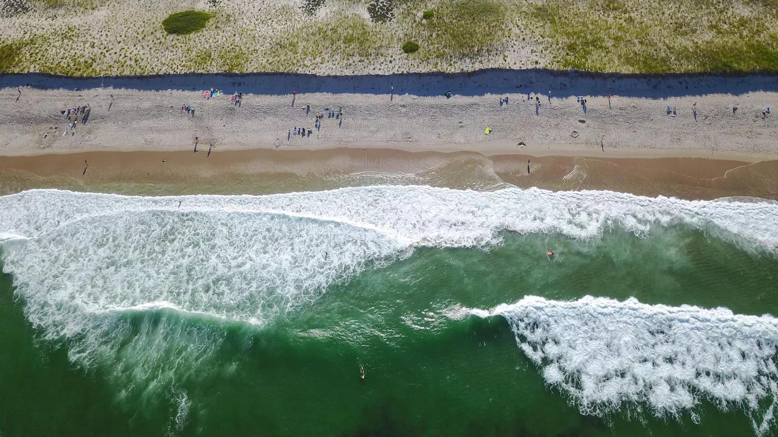 Atlantic Ocean waves wash onto a beach at Cape Cod in Massachusetts.