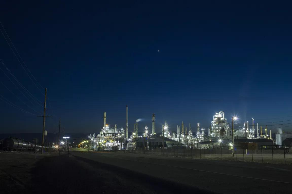 An oil refinery lit up at night