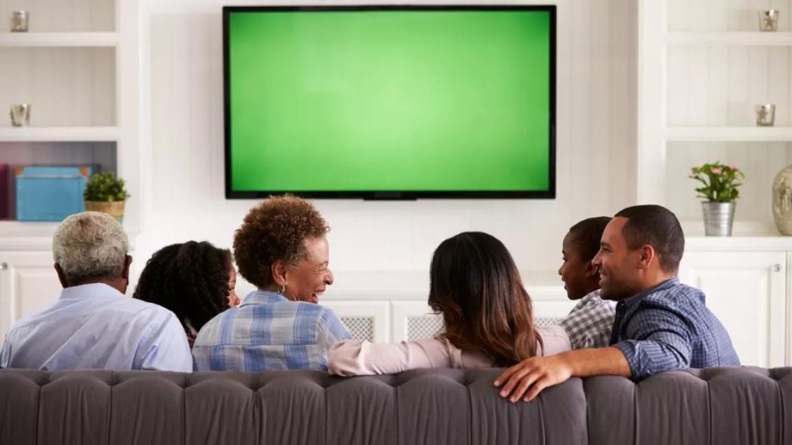 multi-generation-family-watching-TV