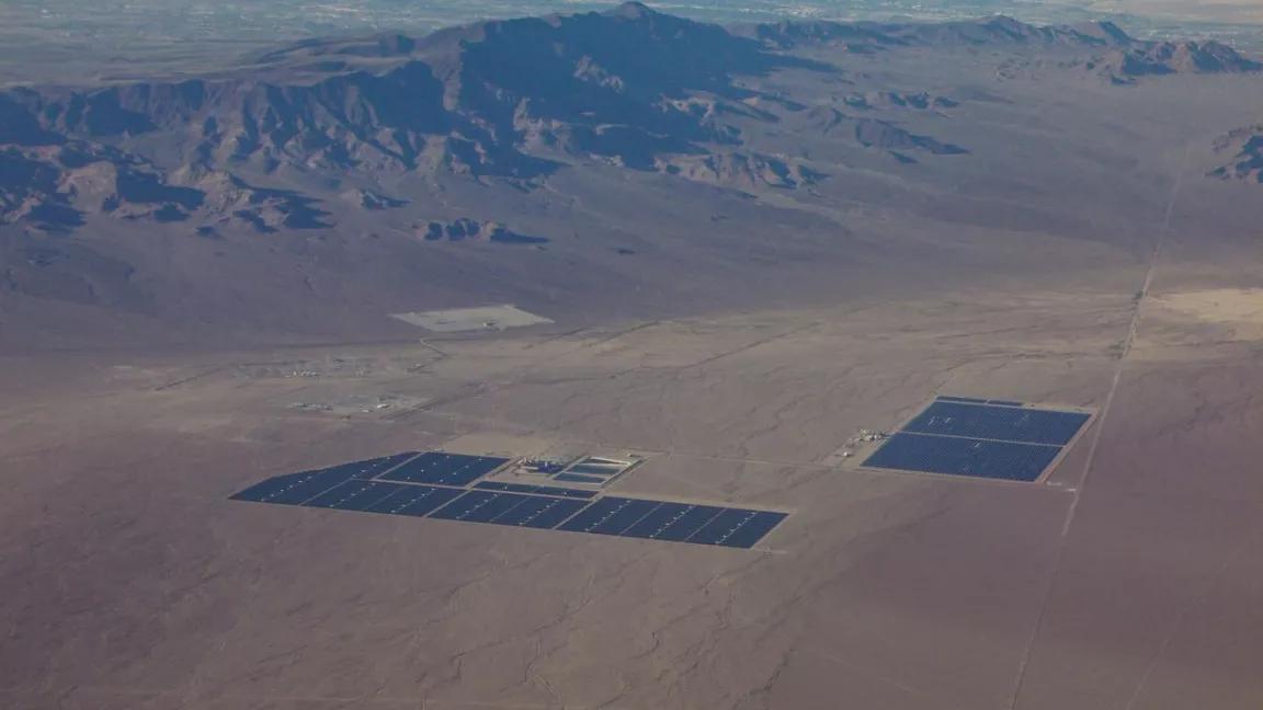 Solar power plants in Nevada with Las Vegas Strip in the background