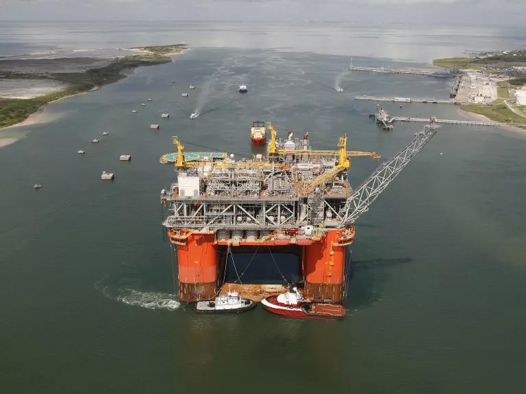 An offshore platform on its way to a drilling location in the Gulf of Mexico after being built in a shipyard in Ingleside, Texas