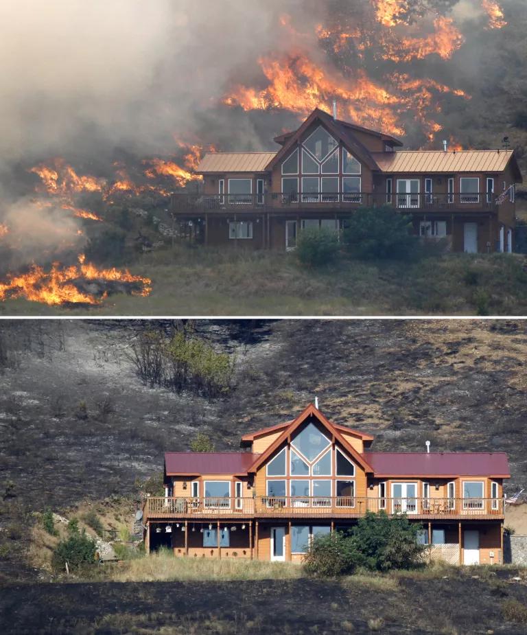 A home on a hillside near Cle Elum, Washington, surrounded by wildfire flames on August 14 (top) and unscathed on August 15, 2012 (bottom). 

A spokesman for the Washington state Department of Natural Resources said the home survived the fire because of the defensible space around the structure with the placement of the driveway and the lack of trees and brush up against it, preventing flames from reaching it.