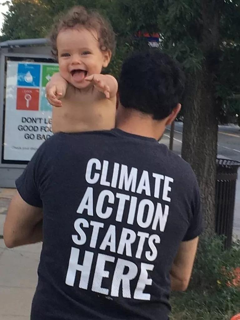 parent and child acting on climate