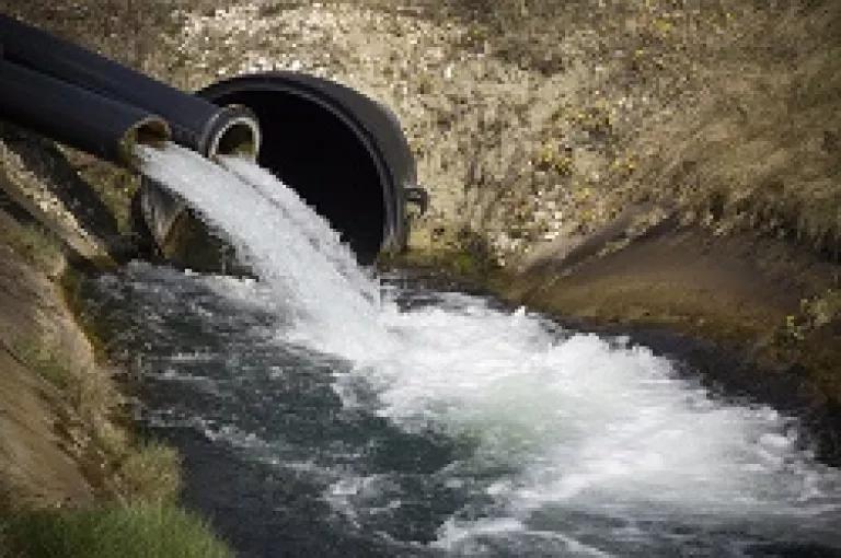 discharge into river