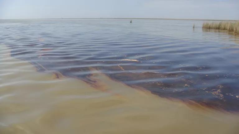 Oil floating on the water after a spill in South Pass, Louisiana on April 6, 2010.