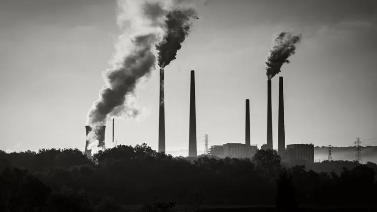 A black and white image of a coal-fired power plant