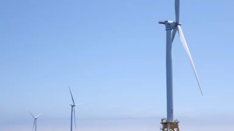 A motor boat approaches the base of a turbine on Block Island Wind Farm, photographed during a trip with the Blue-Green Alliance on June 26, 2019. The wind farm is located in the Atlantic Ocean 3.8 miles from Block Island, Rhode Island.

Block Island Wind Farm is the first commercial offshore wind farm in the US, with five turbines producing 30 megawatts of energy.