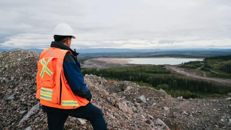 A field biologist looking out over the Mount Polley remediation site