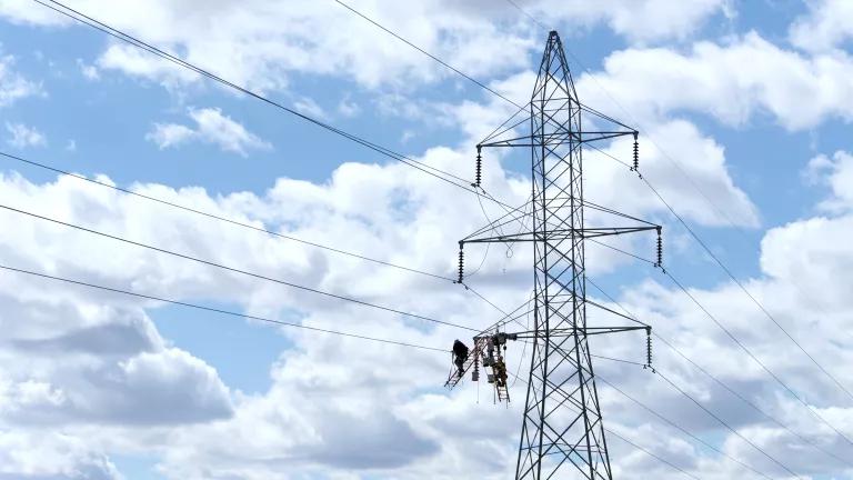 Workers repairing high voltage power lines in Lincoln, Nebraska