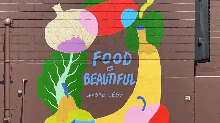 A mural that reads "Food is Beautiful"
