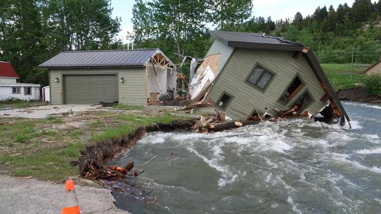 A home collapsed into a flooded Rock Creek on 9th St. in Red Lodge, Carbon County, Montana, on June 17, 2022.