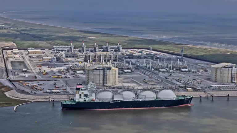 An aerial view of a liquefied natural gas (LNG) tanker ship docked at Venture Global’s Calcasieu Pass export facility in Cameron Parish, Louisiana.