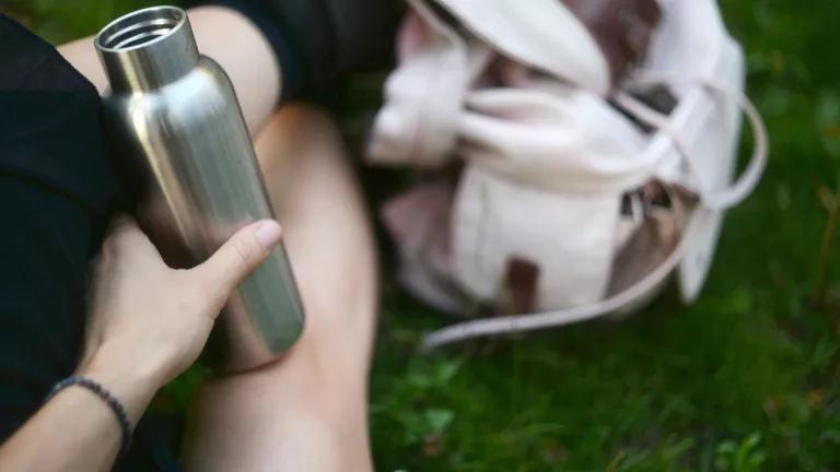 Stainless steel reusable bottle.