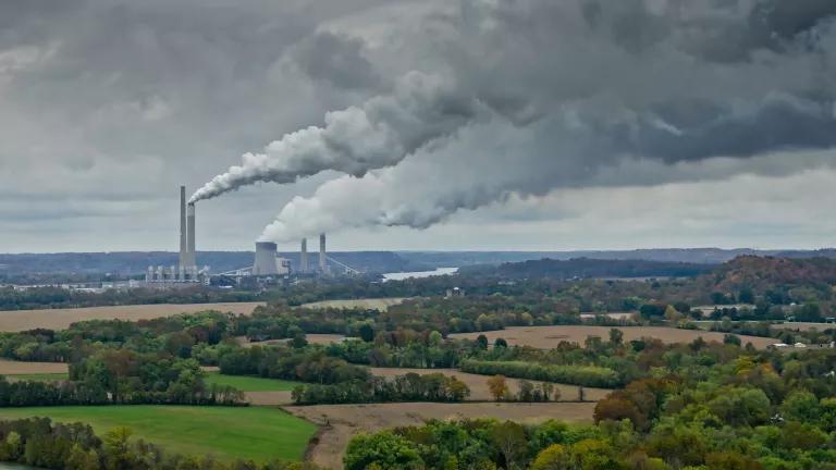 An aerial view across farmland and forest in West Virginia looking toward emissions pouring from Kyger Creek Power Plant and Gavin Power Plant, two coal-fired power stations located on the Ohio River in Cheshire, Ohio.

Due to groundwater contamination and air pollution, the owners of Gavin Power Plant were forced to buy the properties of the residents of Cheshire; it is now almost a ghost town.