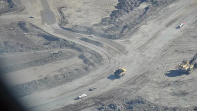 Aerial tar sands mine and trucks credit David Hawkins.JPG