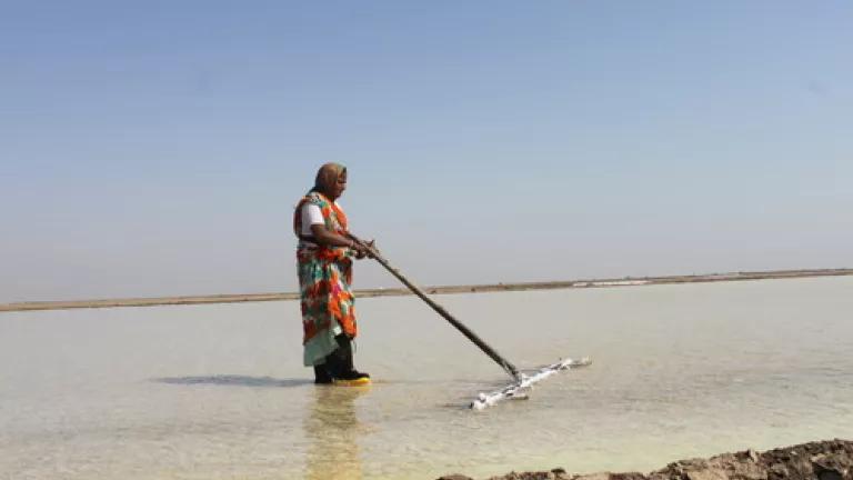 A salt-pan worker in the Little Rann of Kutch in Gujarat, India. 
