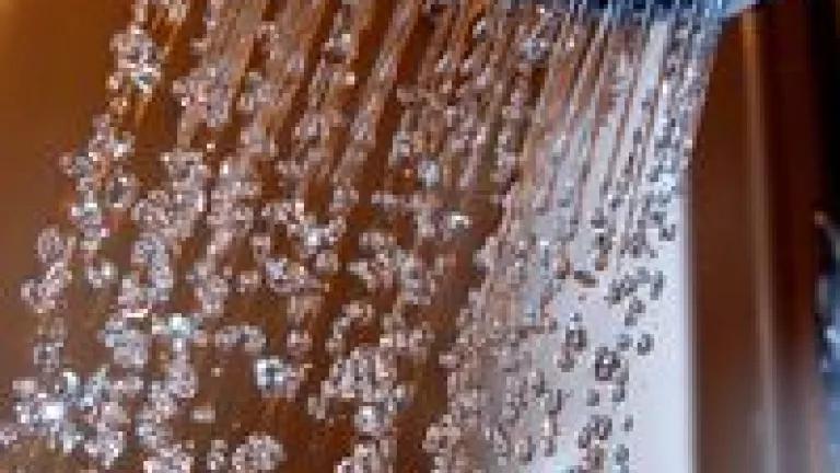 Shower Head with Droplets Close Up.jpg