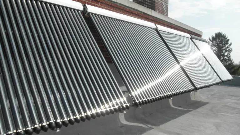 Wall-mounted evacuated tube solar thermal system