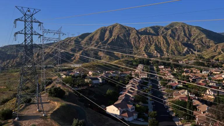 High voltage electrical transmission lines stretch over homes in Sylmar, California, on March 24, 2026.