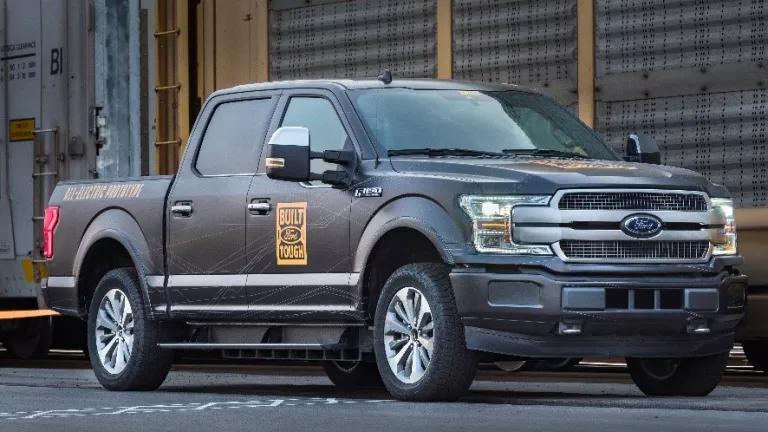 Electric Ford F-150 Towing Freight Train