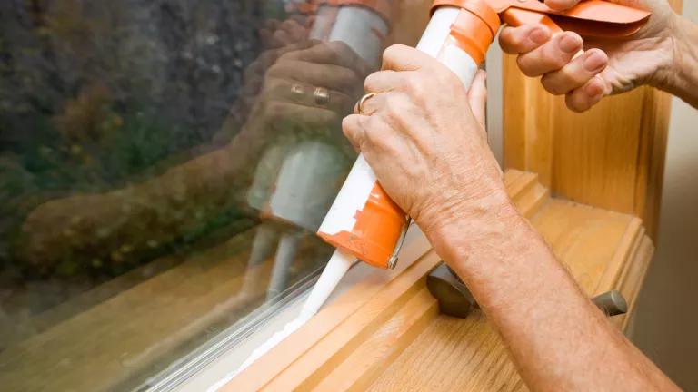 Applying weatherization to home window