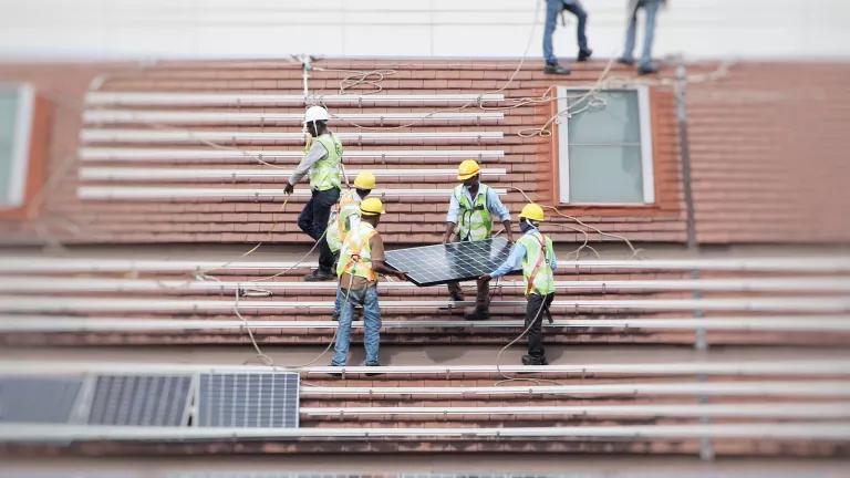 Solar Workers on Roof
