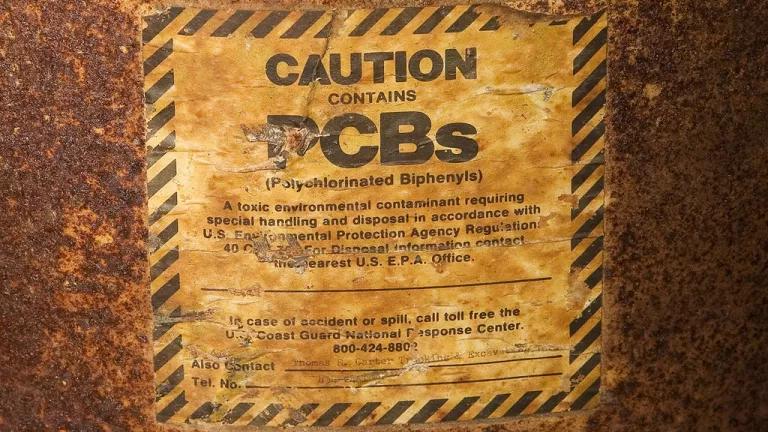 Label on rusted drum of PCBs