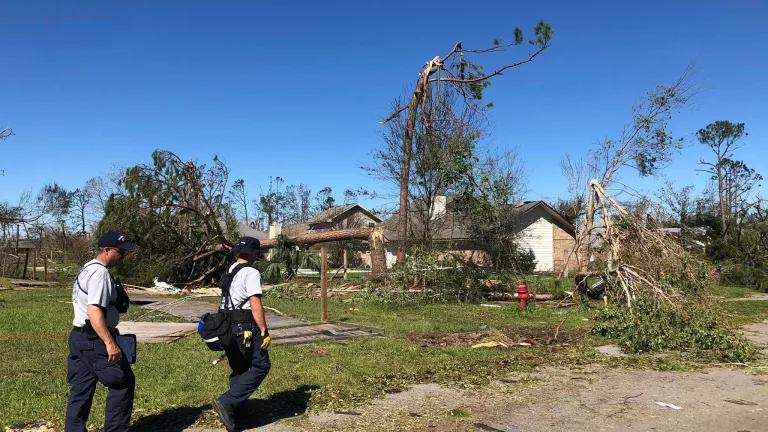 Search and rescue crew walking door to door in Panama City, Florida