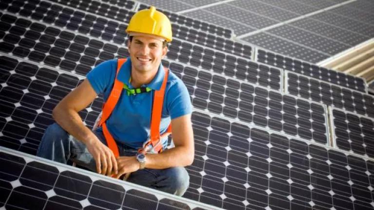 Construction_worker_with_solar_panels_JPG.jpg