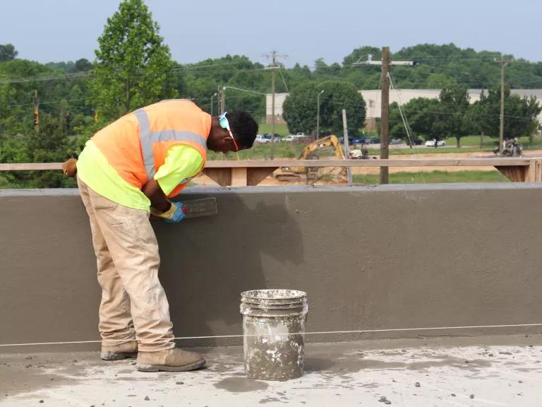 A man working on a bridge construction project