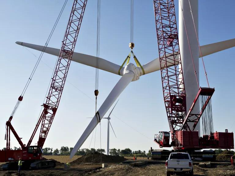 A wind turbine rotor assembly being raised into position during the construction of a turbine at Big Sky wind farm in Ohio, Illinois, on September 29, 2010. 

When completed, Big Sky will use 114 Suzlon 2.1MW S88 turbines to generate enough electricity each year to power nearly 50,000 homes.