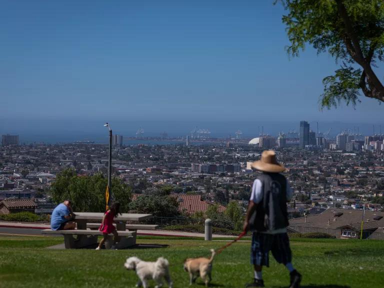 A view looking out toward the Port of Los Angeles from Hilltop Park in the Signal Hill neighborhood of Los Angeles, California, on June 25, 2024. 

Residents of Wilmington, Signal Hill and Long Beach suffer damaging health impacts from the toxic fumes of diesel trucks and various local oil infrastructure, including drilling sites and the nearby Valero Wilmington Refinery.