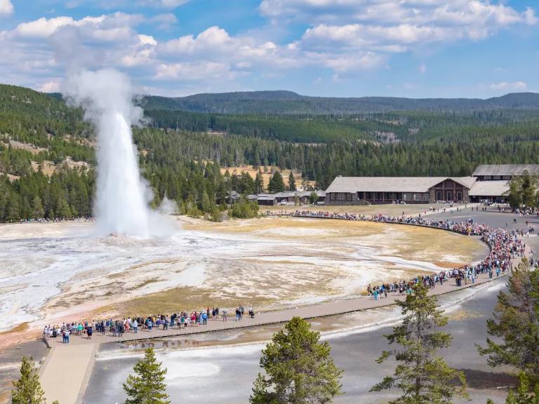 Visitors watching an eruption of Old Faithful in the Upper Geyser Basin in Yellowstone National Park, Wyoming. 

The park recorded 4.74 million visits in 2024.