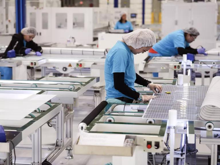 Joana Picazo soldering solar cells at a repair station at Elin Energy's solar panel manufacturing facility in Brookshire, Texas, on April 25, 2024.