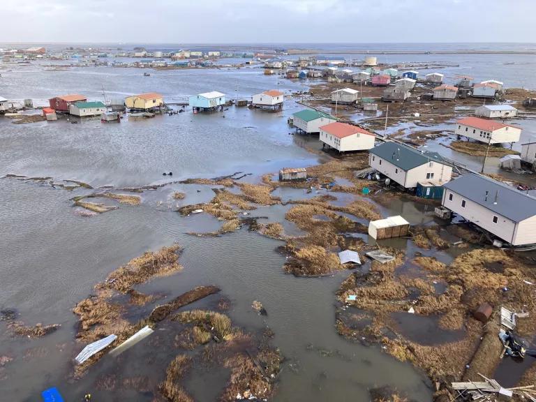 Flooding, debris, and damaged homes in Kipnuk, Alaska, following Typhoon Halong, on October 12, 2025.