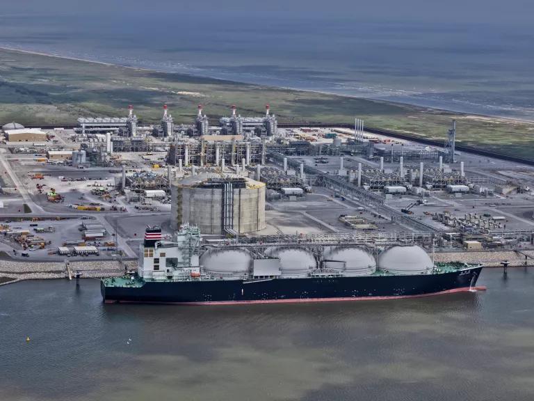 An aerial view of a liquefied natural gas (LNG) tanker ship docked at Venture Global’s Calcasieu Pass export facility in Cameron Parish, Louisiana.