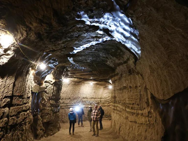 NASA SnowEx campaign researchers and pilots touring the Permafrost Tunnel Research Facility, which contains 18,000- to 43,000-year-old carbon-rich specimens from the last ice age, near Fairbanks, Alaska, on May 3, 2023. 

The facility is one of the only places on the planet where researchers can walk inside the frozen earth.