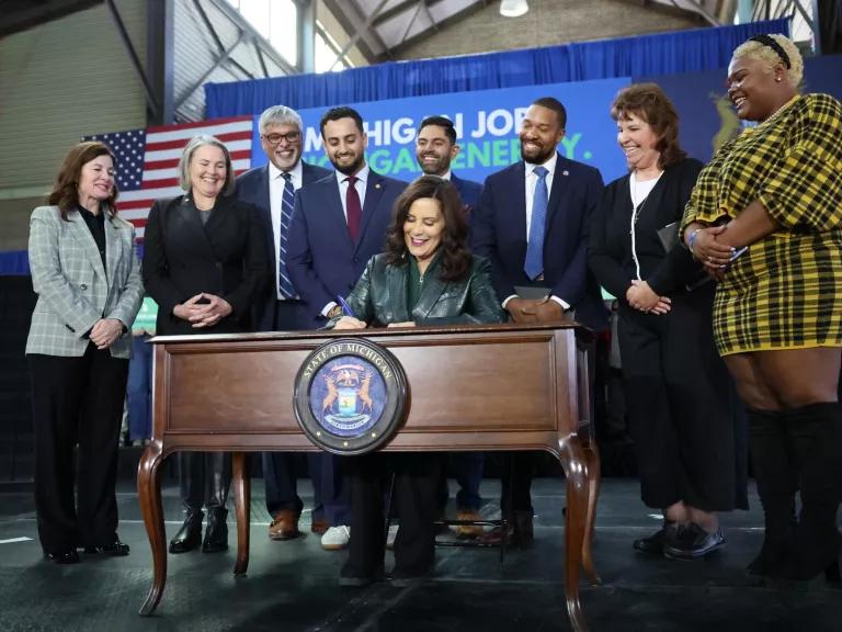 Governor Gretchen Whitmer signing a Clean Energy and Climate Action Package in Lansing, Michigan, on November 28, 2023.

The legislation makes Michigan a national leader with a 100% clean energy standard, strong labor provisions to build clean energy, streamlined construction of energy projects, and lower utility costs.