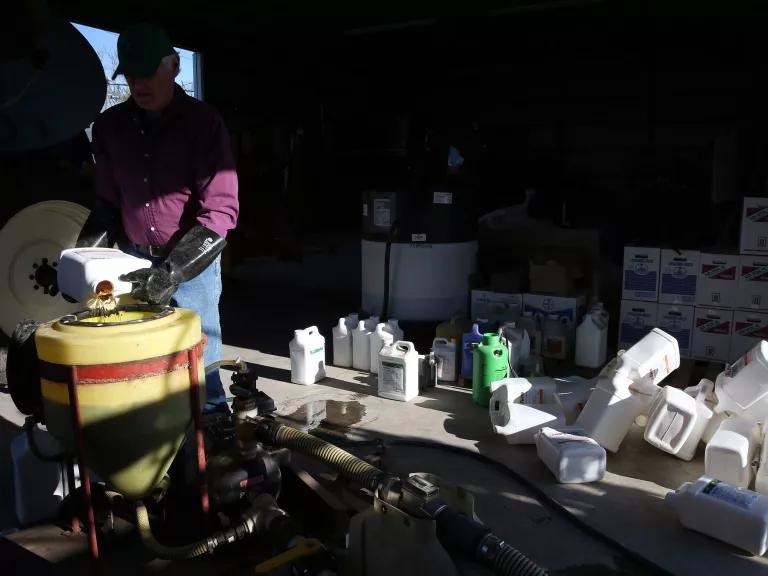 Farmer Bach Bakehouse mixes a pesticide cocktail that includes glyphosate, to be sprayed on the soybean and corn fields at his farm in Hastings, Iowa, on April 30, 2015.