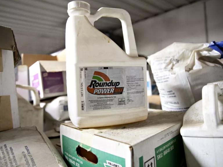 A 2.5 Gallon bottle of Roundup POWERMax, which contains 51.2% glyphosate, sits atop a box at a farm in Princeton, Illinois, on March 28, 2019.
