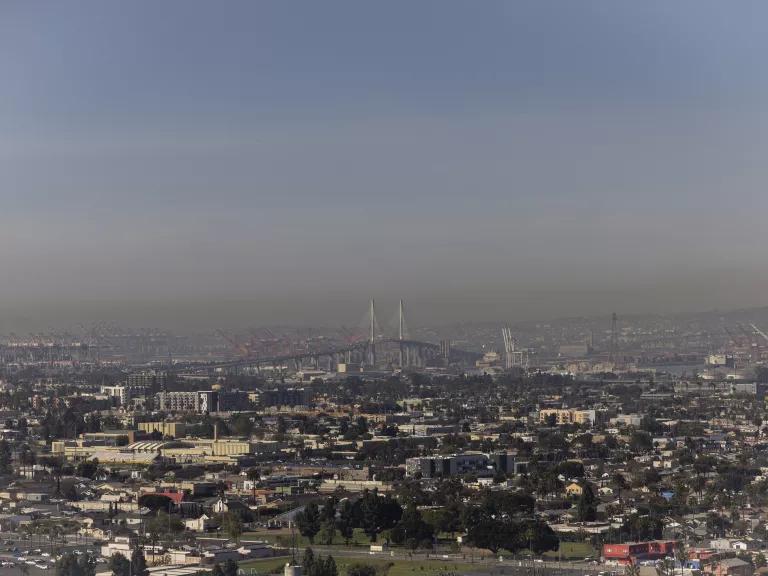 Smog lingers over the city overlooking the Ports of Long Beach and Los Angeles as seen from Signal Hill, California, on March 10, 2025.